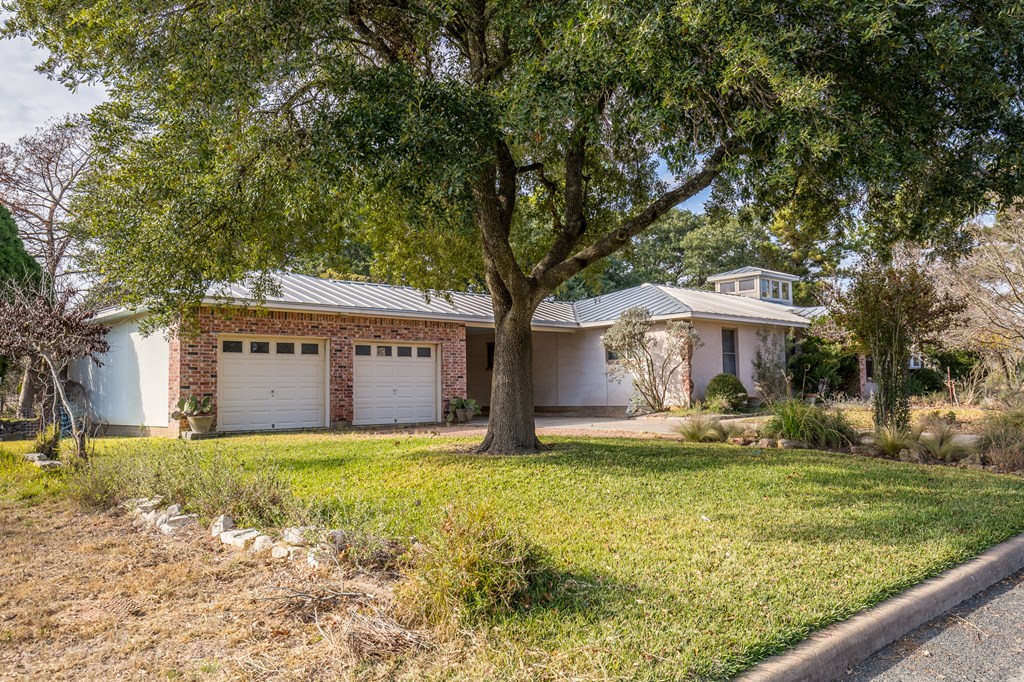 307 Frederick Road Fredericksburg, TX 78624 - Photo 14 of 14 a view of a house with a yard