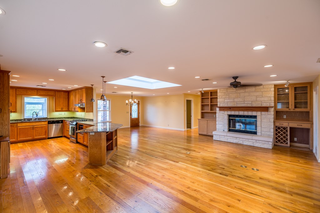 307 Frederick Road Fredericksburg, TX 78624 - Photo 4 of 14 a view of a living room with furniture and a fireplace