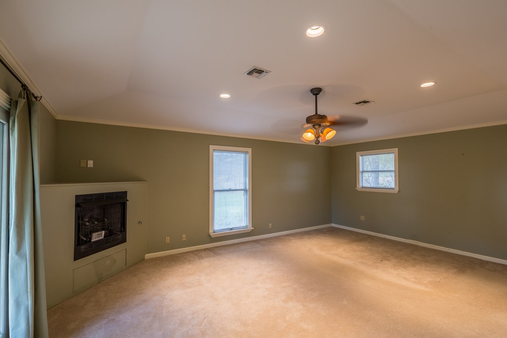 307 Frederick Road Fredericksburg, TX 78624 - Photo 6 of 14 a view of a livingroom with a ceiling fan and window