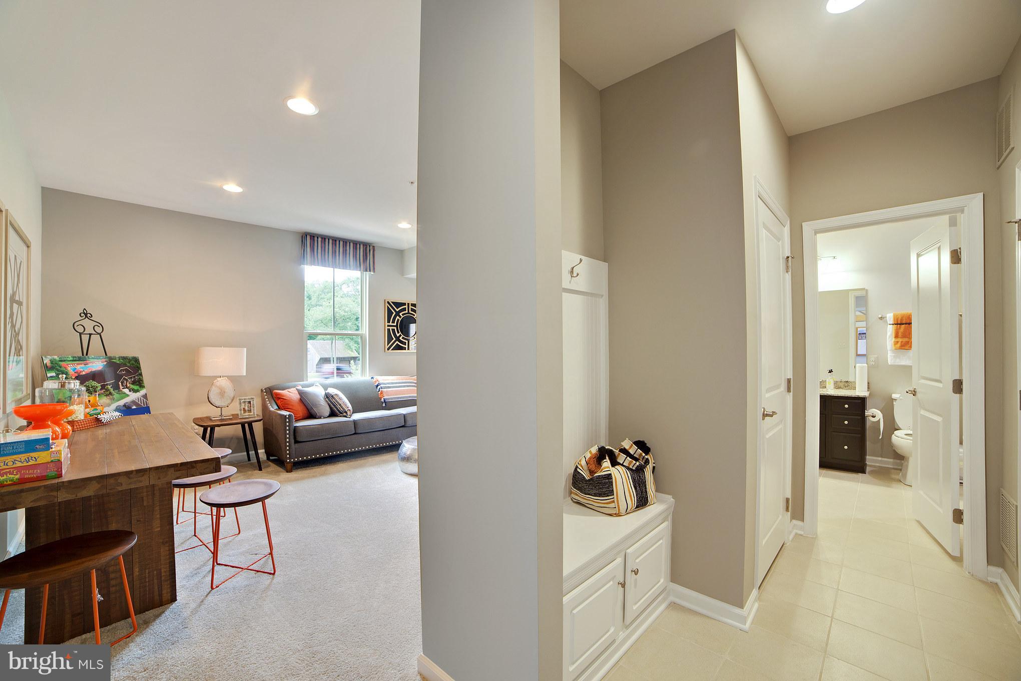 8283 Kippis Road Millersville, MD 21108 - Photo 21 of 28 a bedroom with furniture and a gate