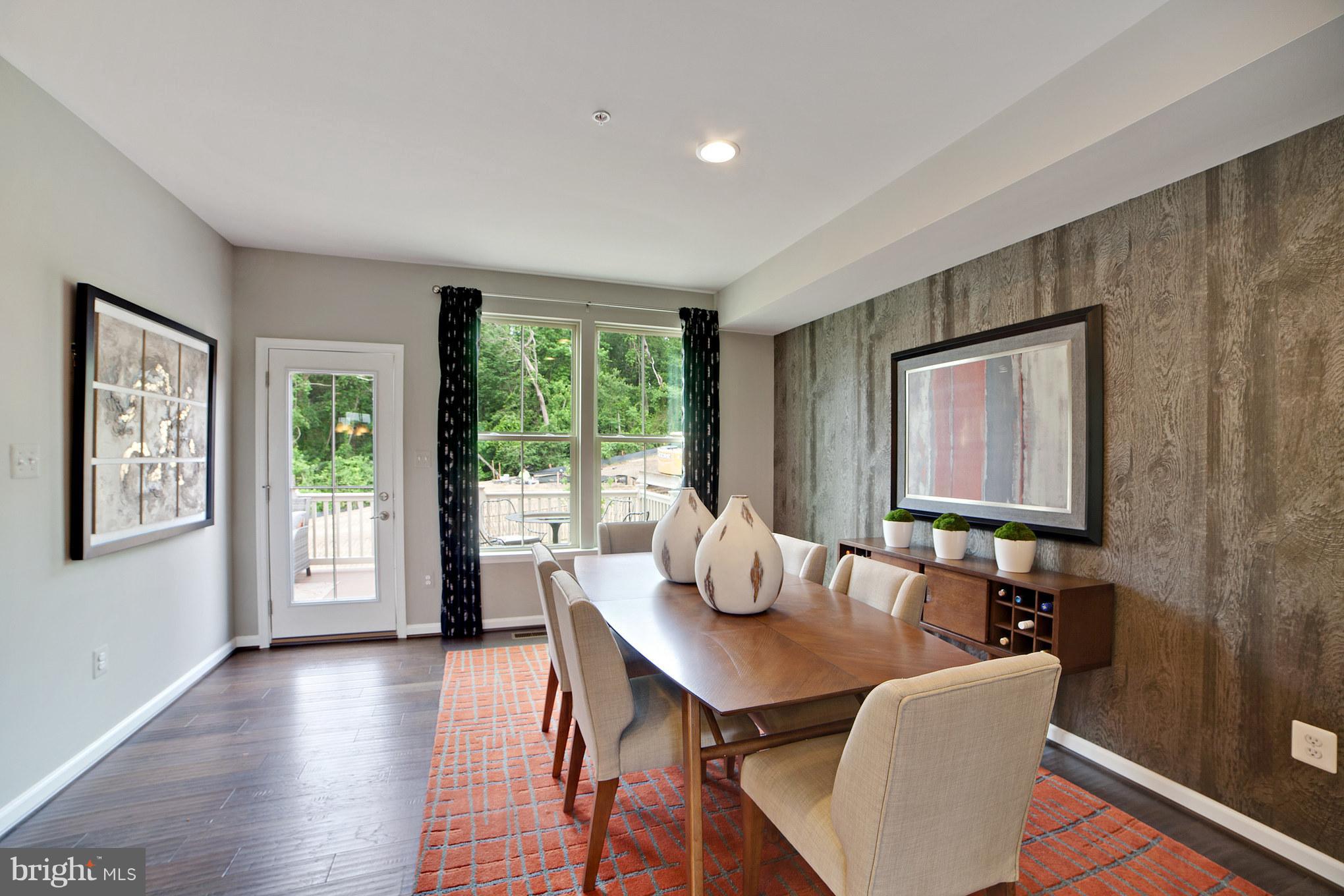 8283 Kippis Road Millersville, MD 21108 - Photo 7 of 28 a living room with furniture and a large window
