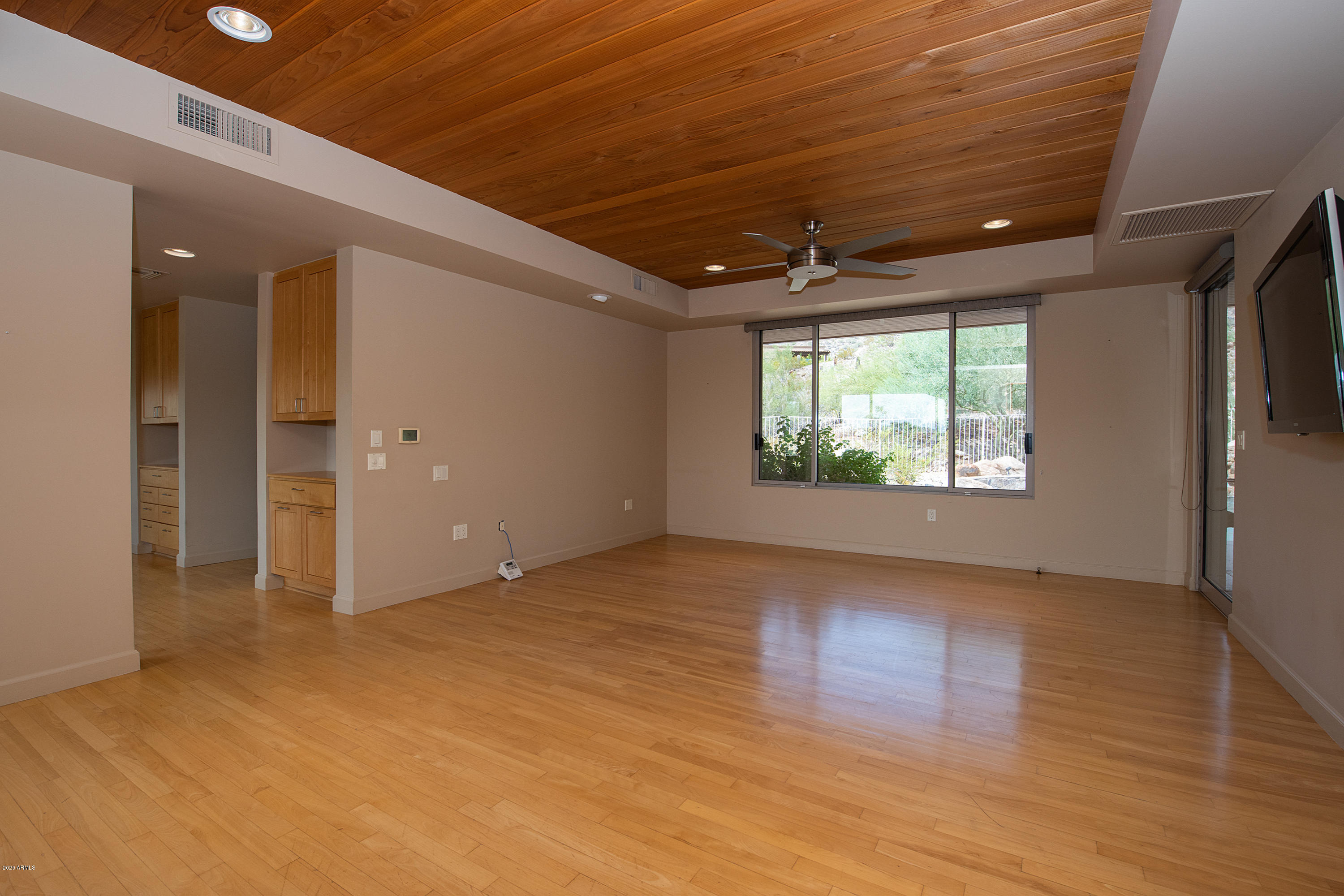 3140 East Ocotillo Road Phoenix, AZ 85016 - Photo 14 of 39 Master suite w/hardwood floors.