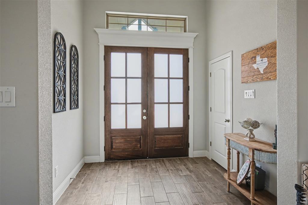 6334 Rustic Edge Street Godley, TX 76044 - Photo 4 of 26 a view of room with furniture and staircase