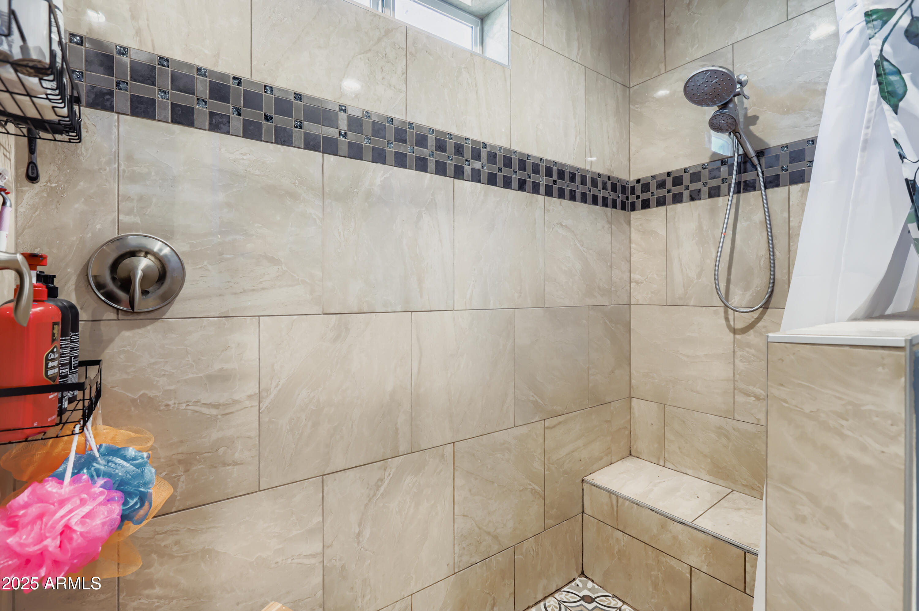 22136 West Gambit Trail Wittmann, AZ 85361 - Photo 17 of 38 a bathroom with a shower