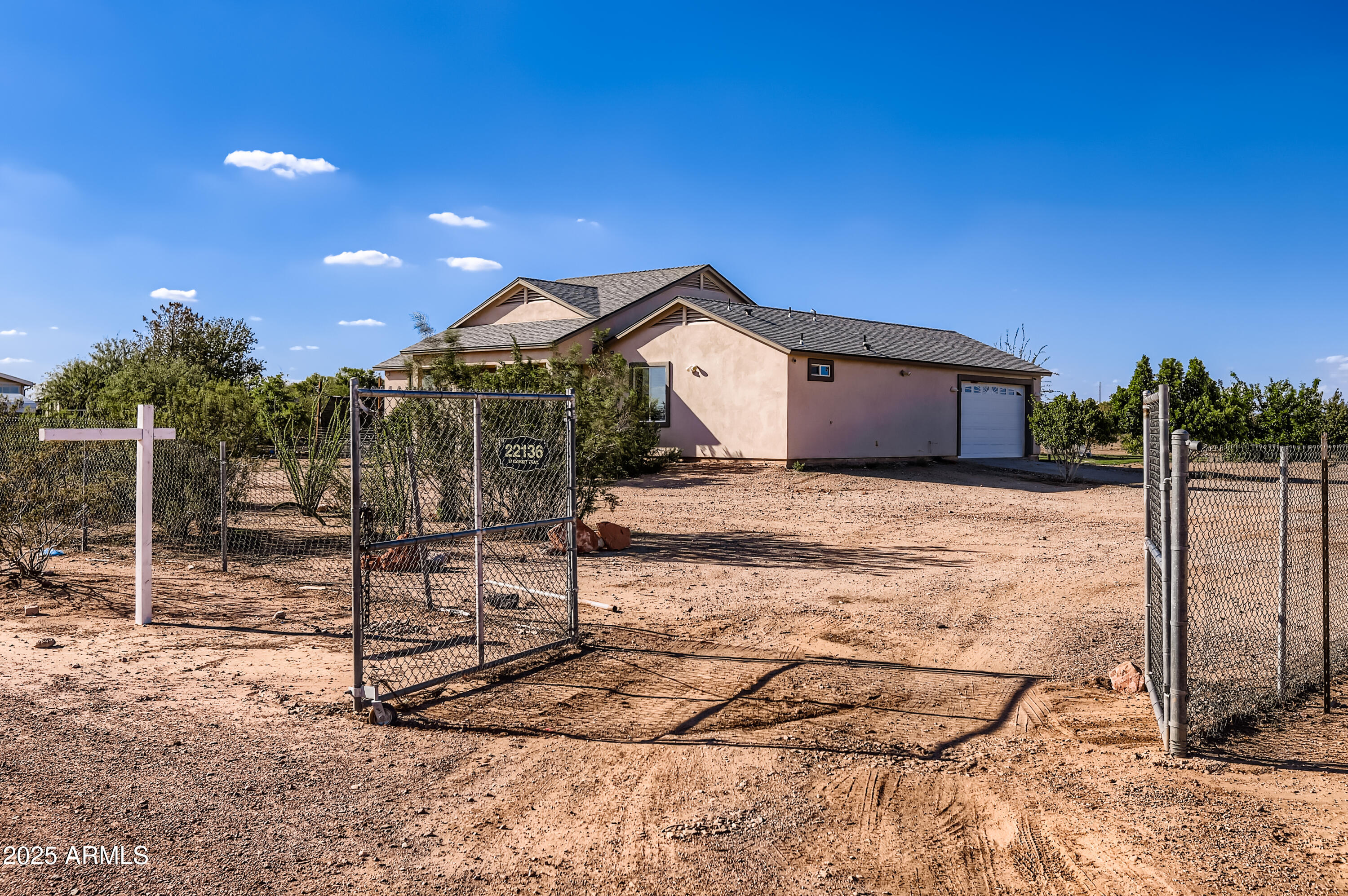 22136 West Gambit Trail Wittmann, AZ 85361 - Photo 35 of 38 a view of a house with a yard