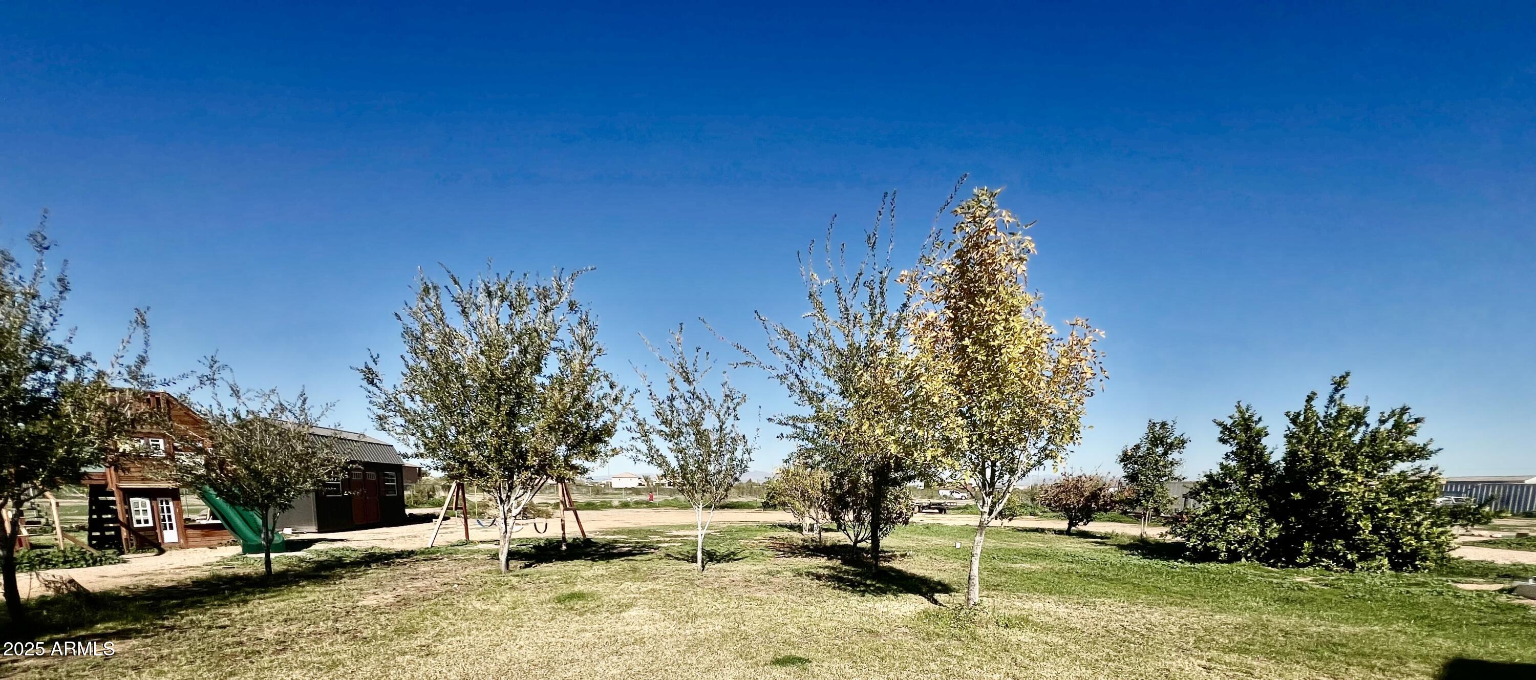 22136 West Gambit Trail Wittmann, AZ 85361 - Photo 37 of 38 a view of outdoor space with garden