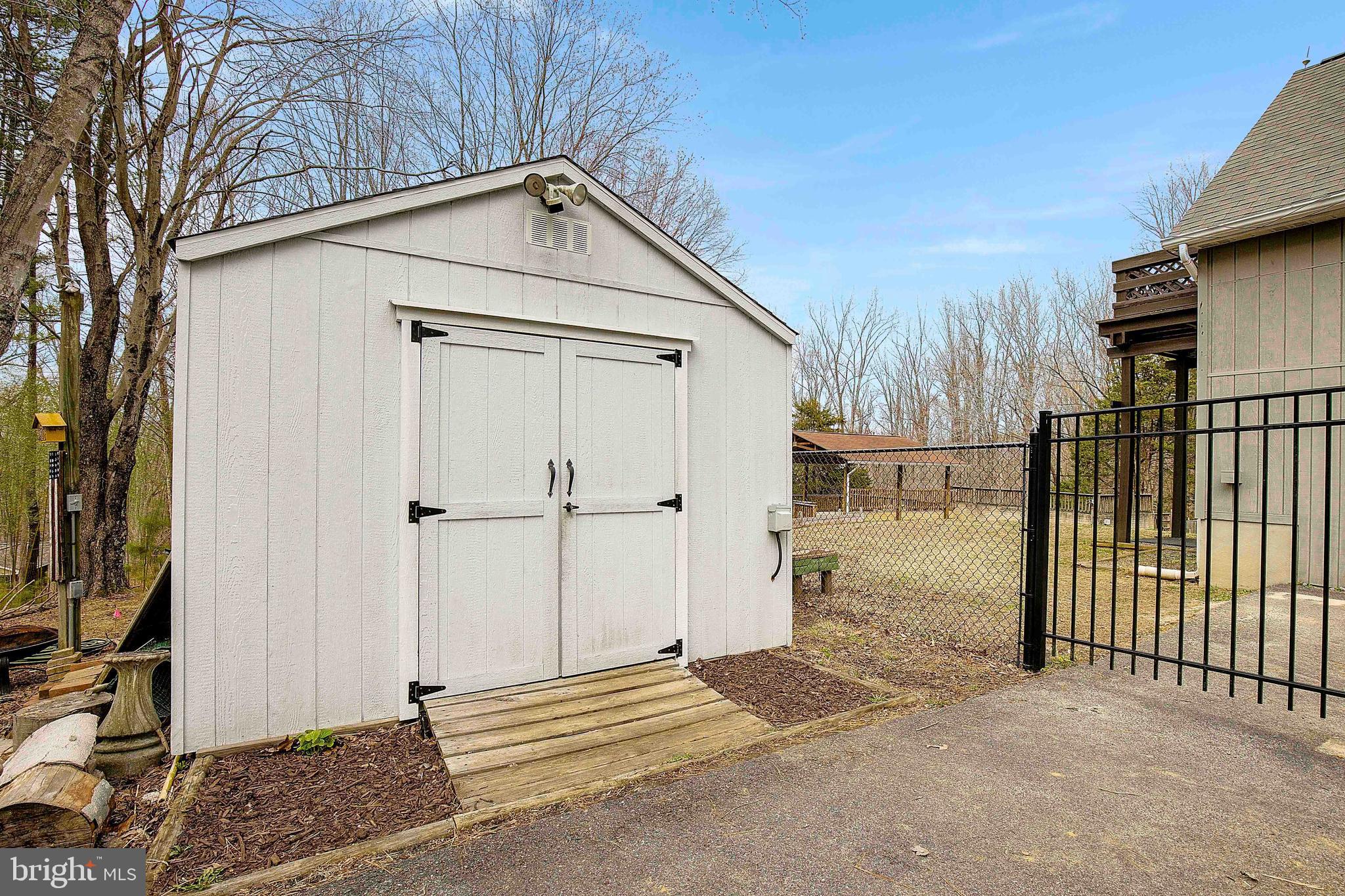3710 Chaneyville Road Owings, MD 20736 - Photo 54 of 71 a view of a house with a small yard