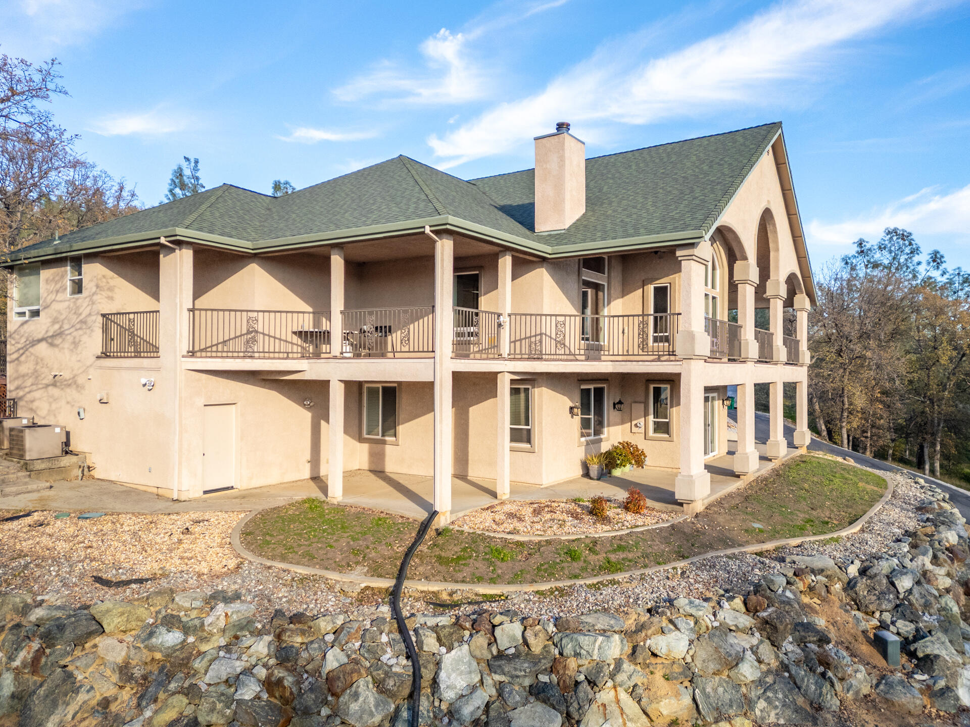 7775 Muletown Road Redding, CA 96001 - Photo 43 of 46 a front view of a house with a yard