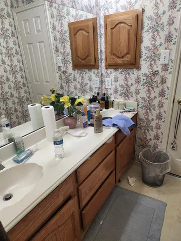 a bathroom with a sink and a tub