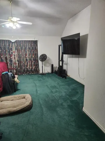 a room with furniture and a chandelier