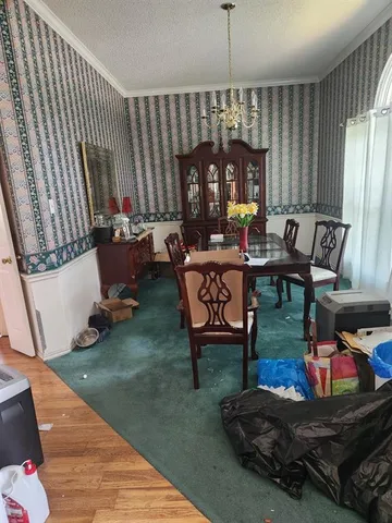 a room with furniture and a chandelier