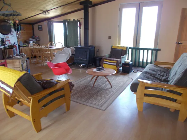 a living room with furniture and a table