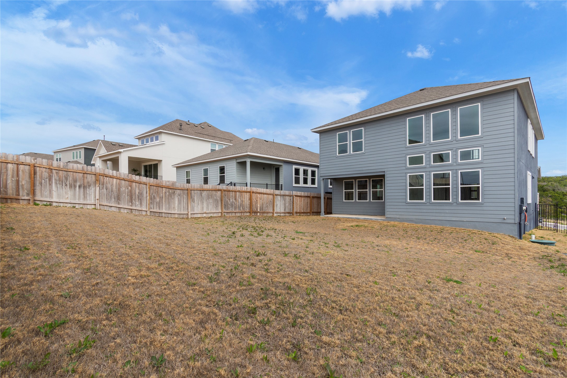 8500 Red Bottle Brush Road Lago Vista, TX 78645 - Photo 31 of 33 A spacious backyard with privacy fencing awaits personalization.