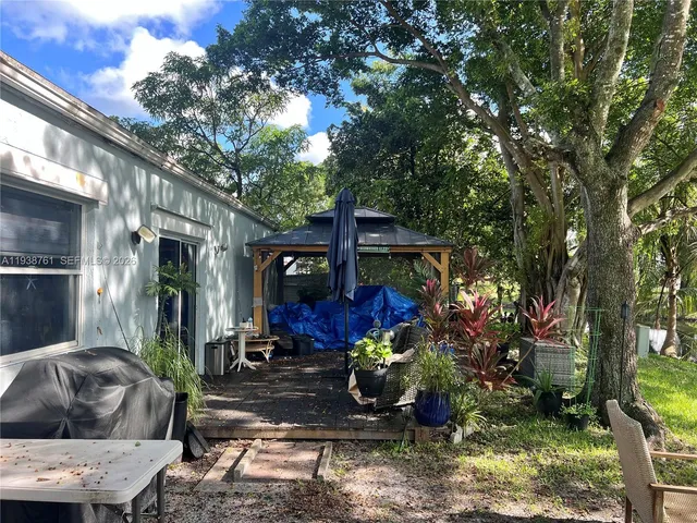 a garden view with a sitting space