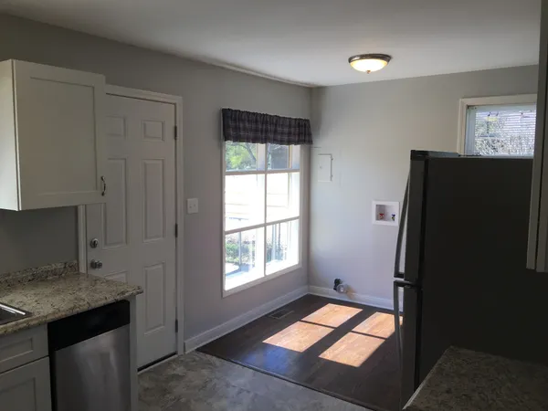 a view of hallway with windows