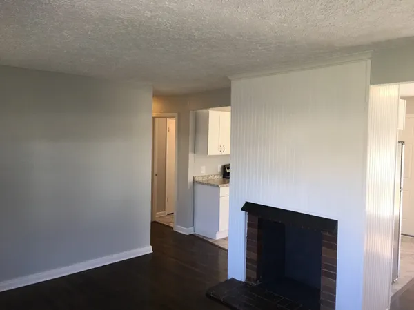 a view of an empty room and window