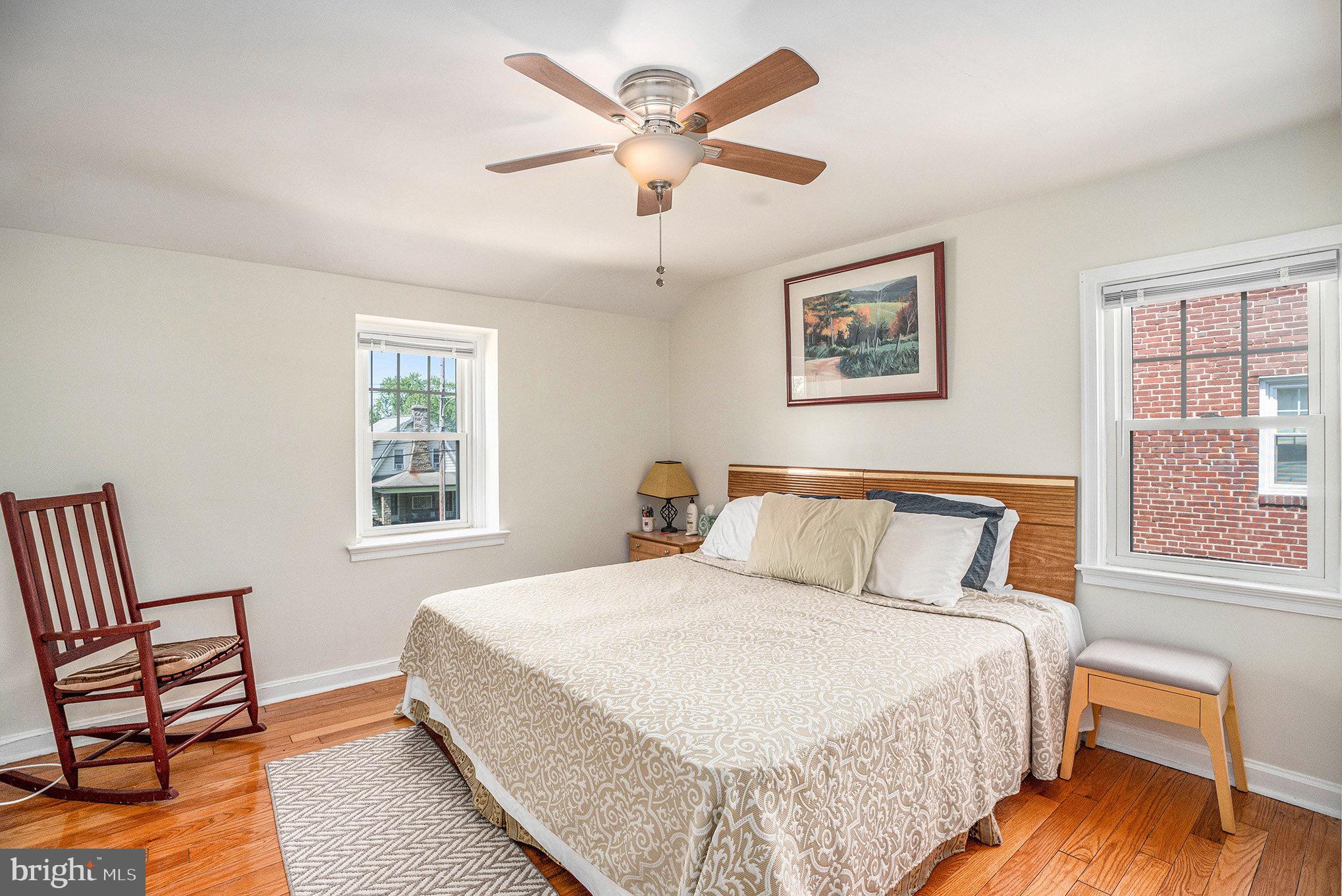 2209 East County Line Road Ardmore, PA 19003 - Photo 16 of 28 a bedroom with a bed and window
