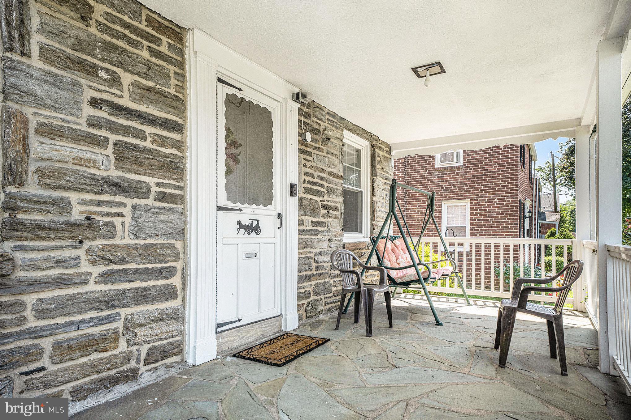 2209 East County Line Road Ardmore, PA 19003 - Photo 5 of 28 a view of an outdoor space with porch and patio
