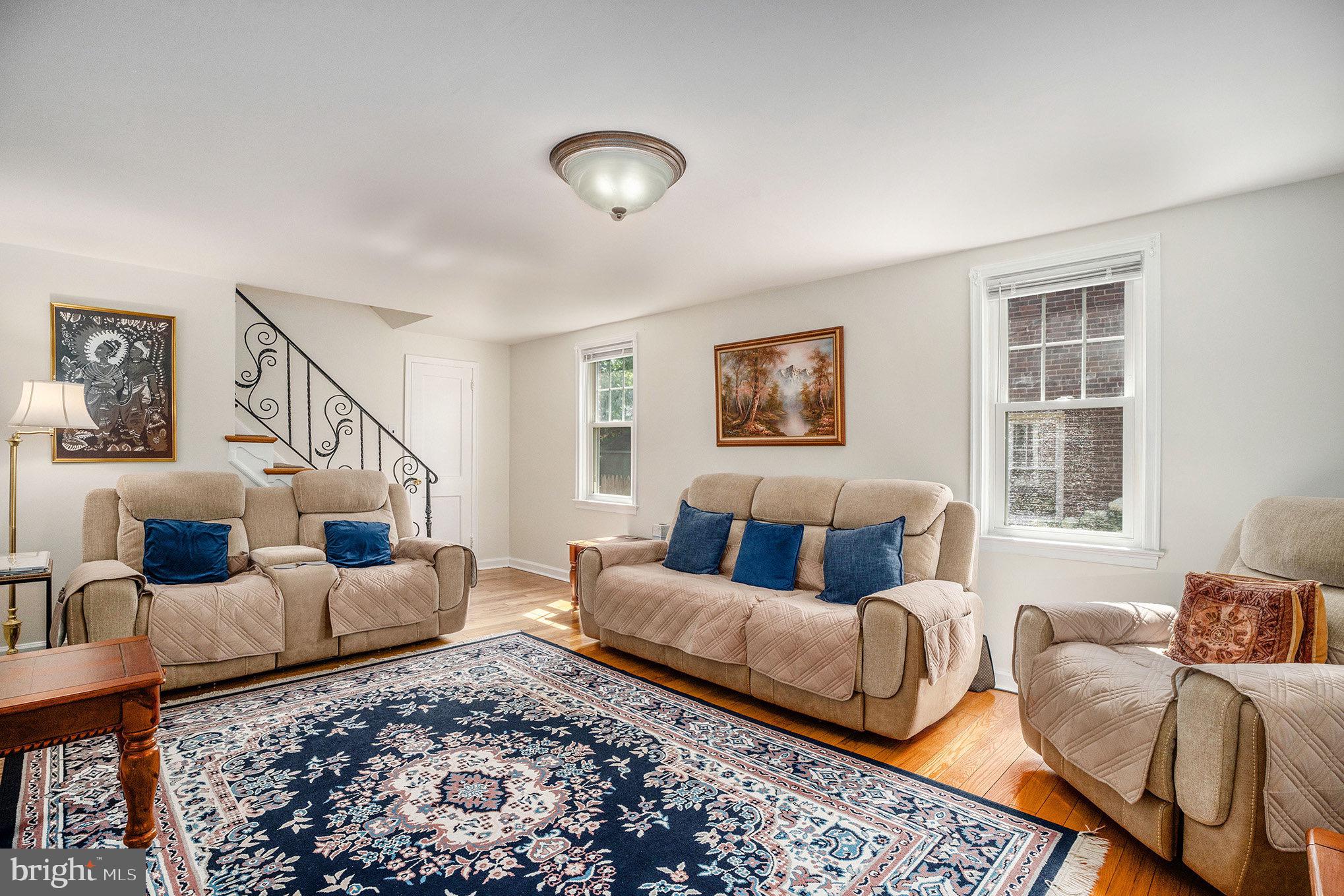 2209 East County Line Road Ardmore, PA 19003 - Photo 7 of 28 a living room with furniture and a window