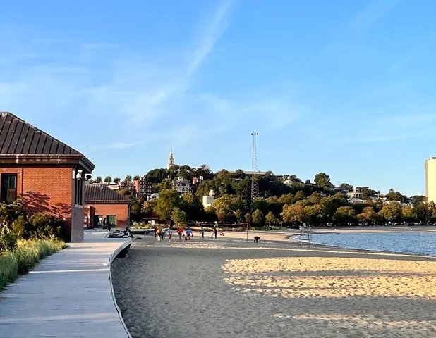 a view of a swimming pool and a chair