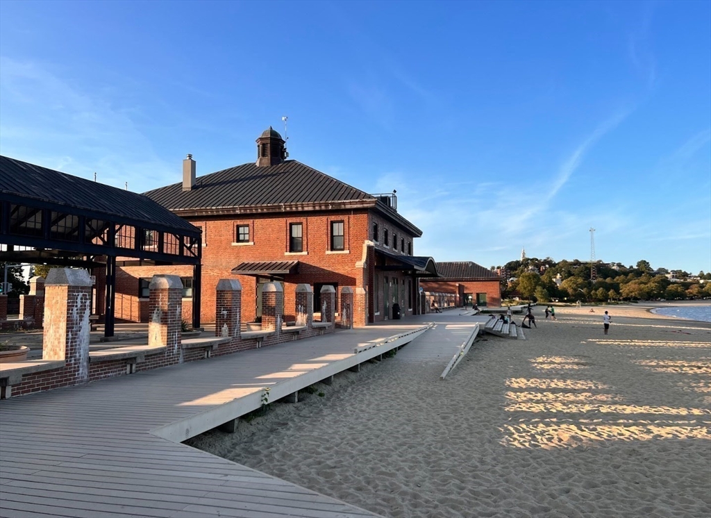 33 Ward Street, Unit 1 Boston, MA 02127 - Photo 14 of 21 a front view of a house with a yard