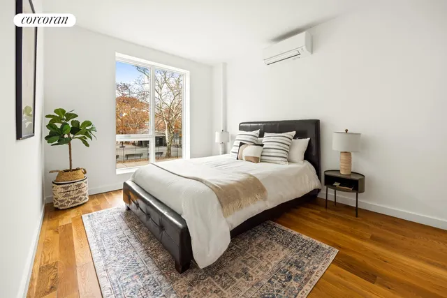 a kitchen with stainless steel appliances a sink stove and cabinets