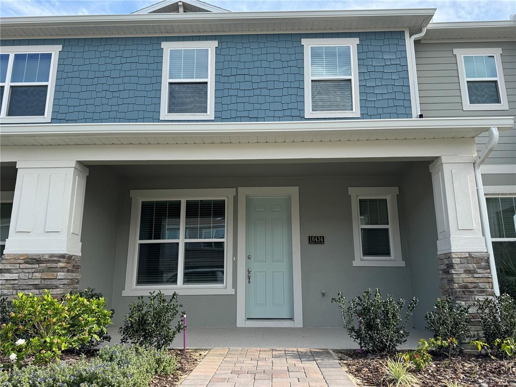 16434 Hamlin Hills Road Winter Garden, FL 34787 - Photo 2 of 50 a front view of a house