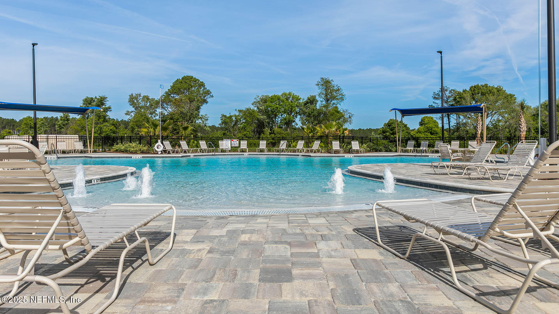12402 Great Eagle Road Jacksonville, FL 32219 - Photo 30 of 60 a view of a swimming pool with a patio