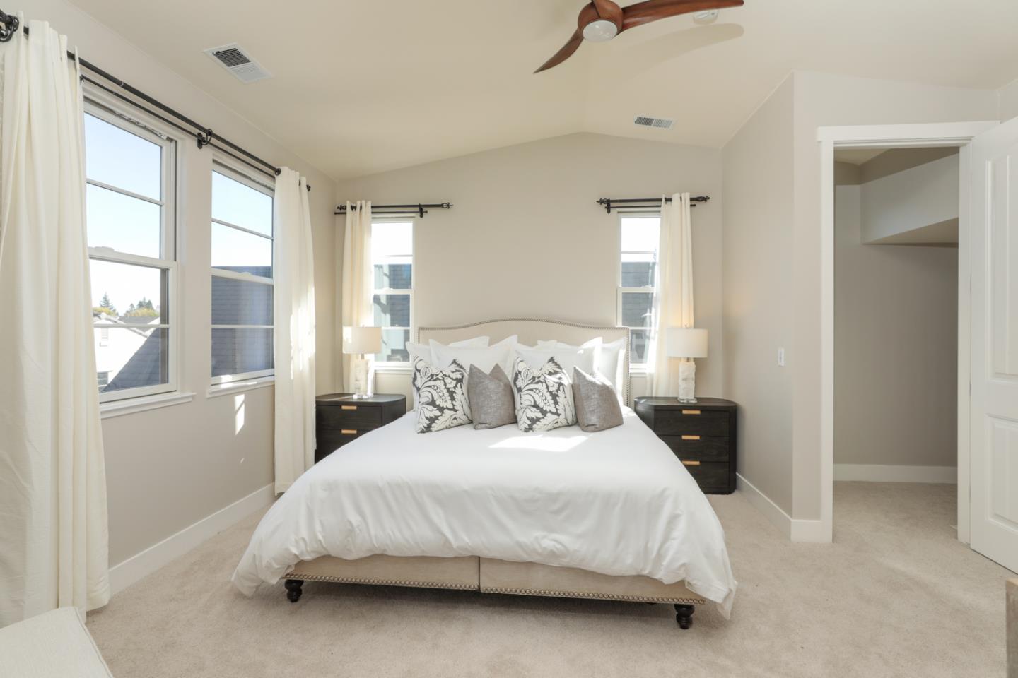 1143 Creek Way Mountain View, CA 94040 - Photo 13 of 24 a bedroom with a bed and a large window