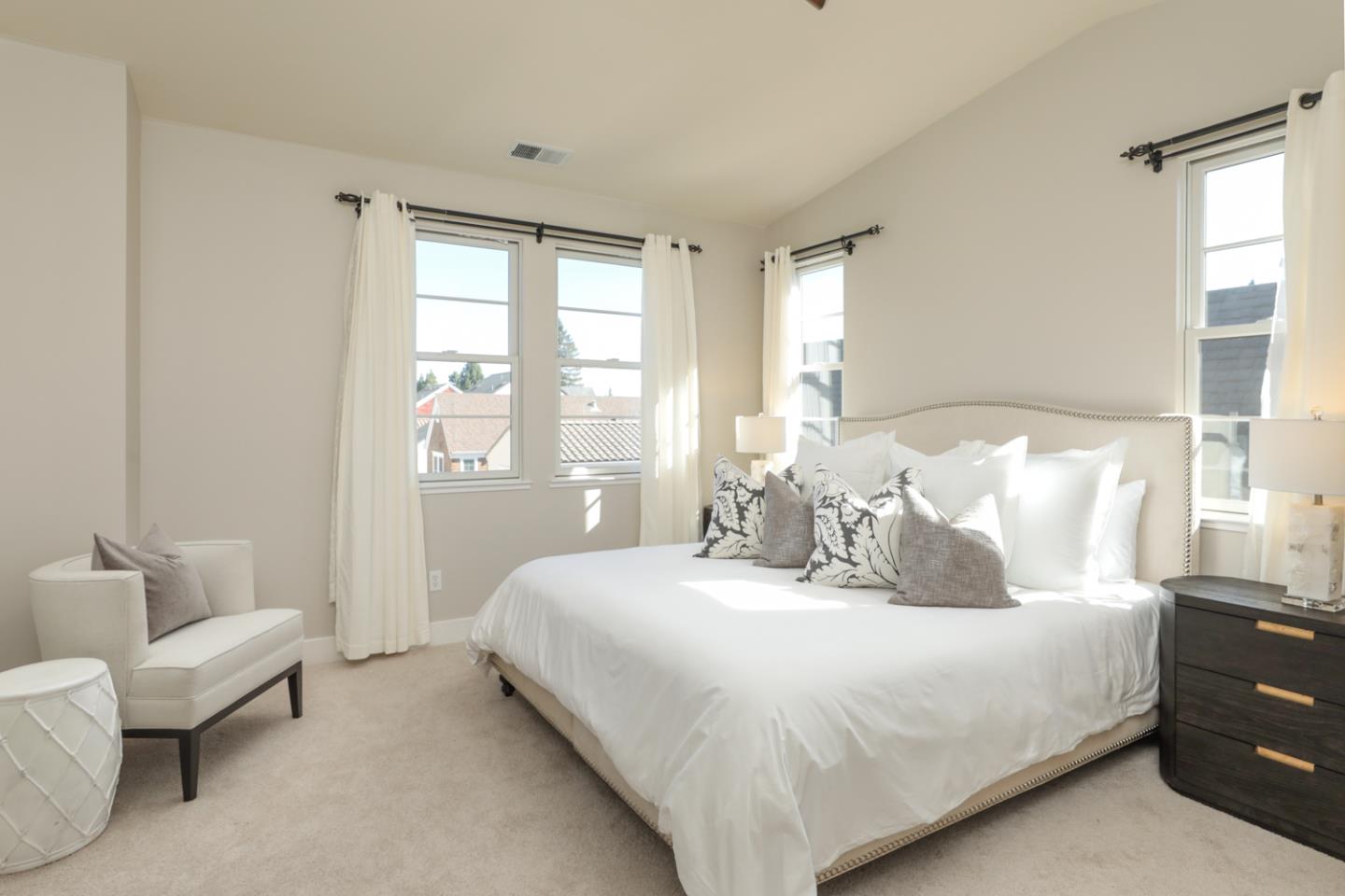 1143 Creek Way Mountain View, CA 94040 - Photo 15 of 24 a bedroom with a bed and a couch