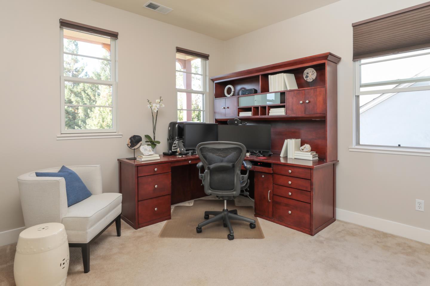 1143 Creek Way Mountain View, CA 94040 - Photo 20 of 24 a livingroom with workspace and a window