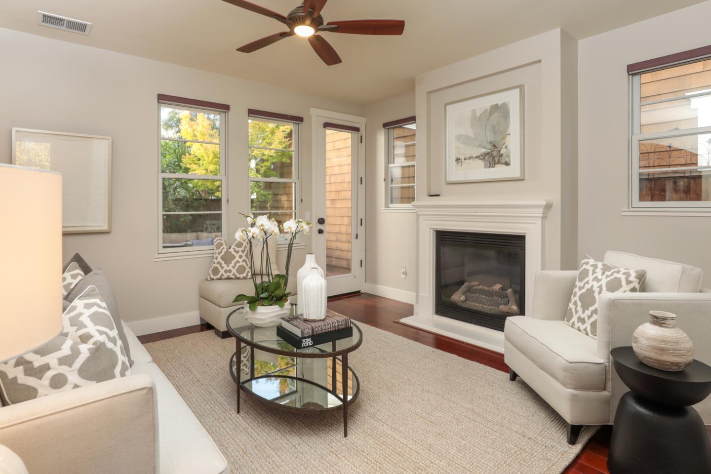 1143 Creek Way Mountain View, CA 94040 - Photo 2 of 24 a living room with furniture and a fireplace