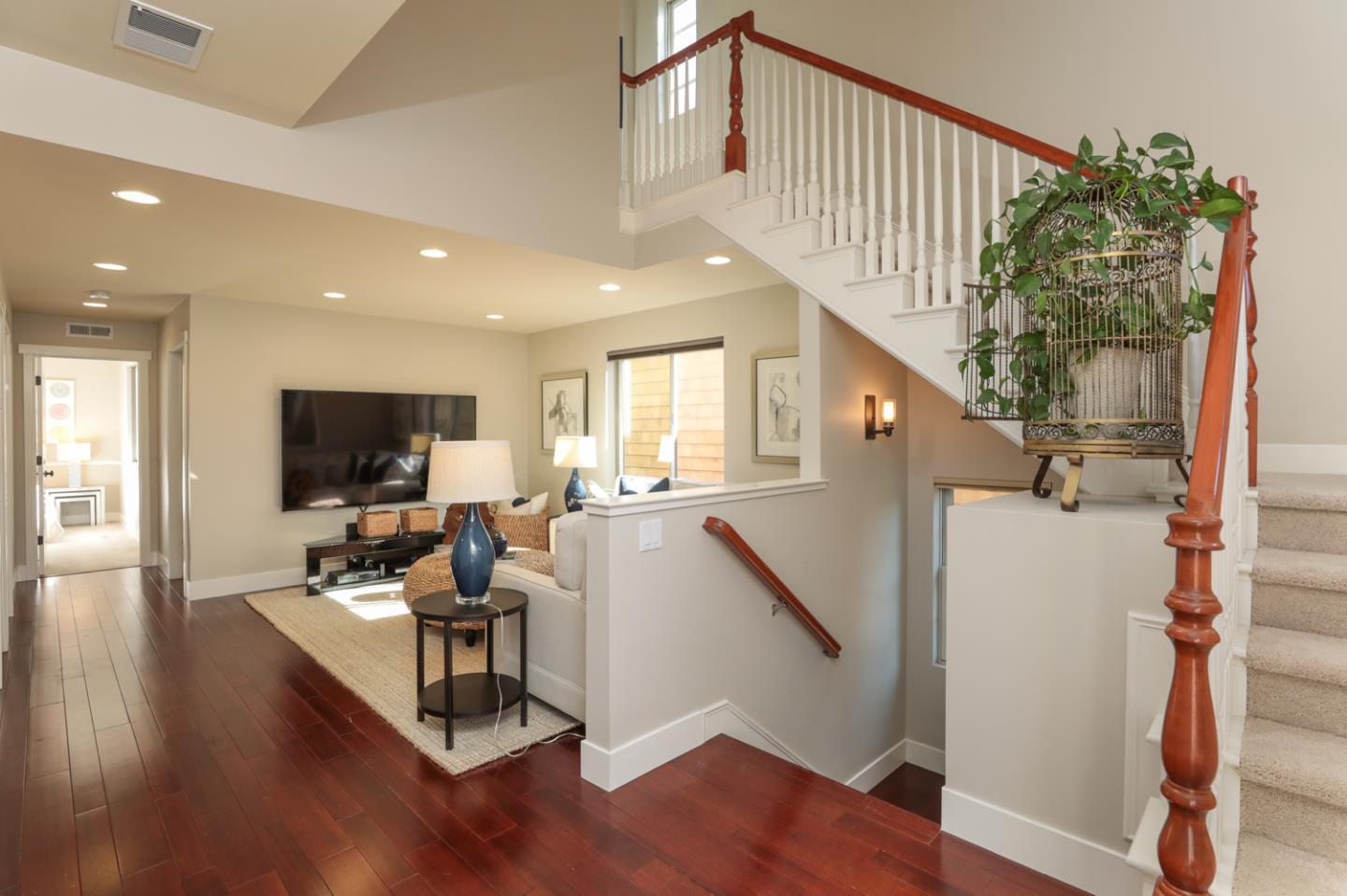 1143 Creek Way Mountain View, CA 94040 - Photo 7 of 24 a living room with furniture and a flat screen tv