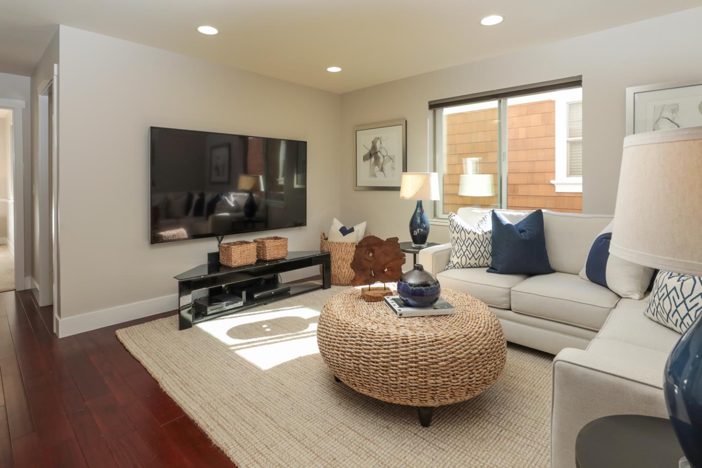 1143 Creek Way Mountain View, CA 94040 - Photo 9 of 24 a living room with furniture and a flat screen tv