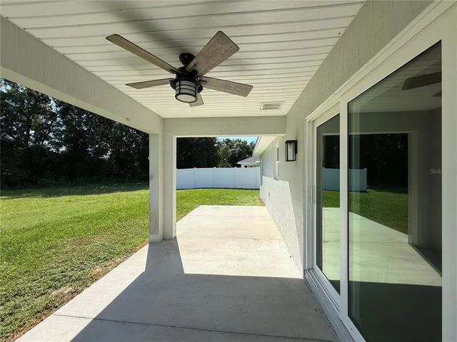 a view of swimming pool with a yard