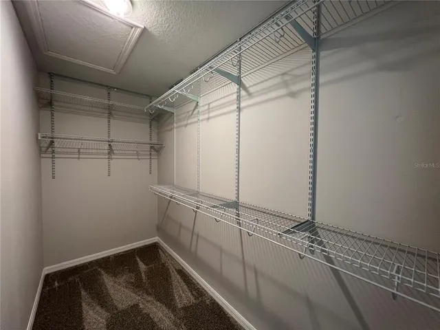 a view of a room with racks on the wall