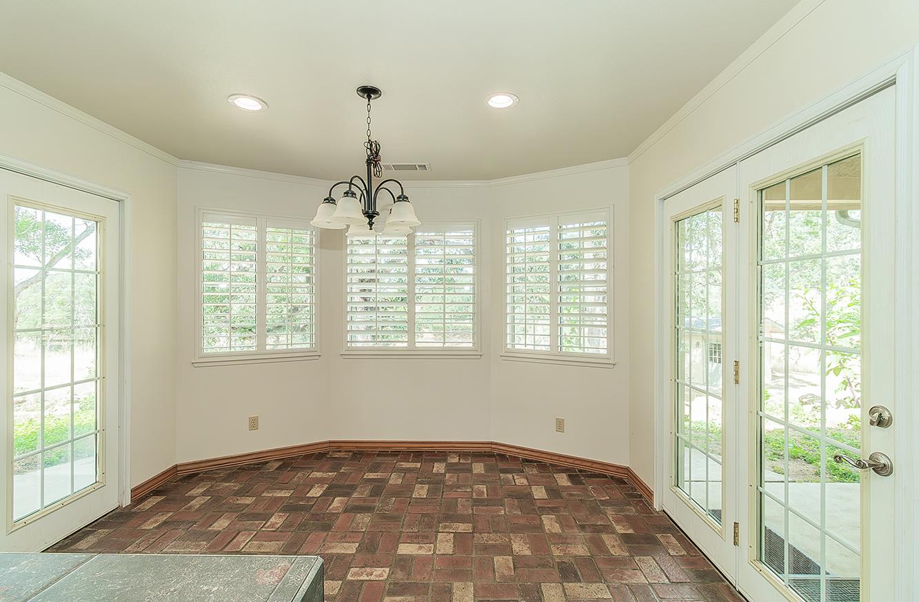 15501 Garlock Lane Prather, CA 93651 - Photo 13 of 47 a view of an empty room with a window