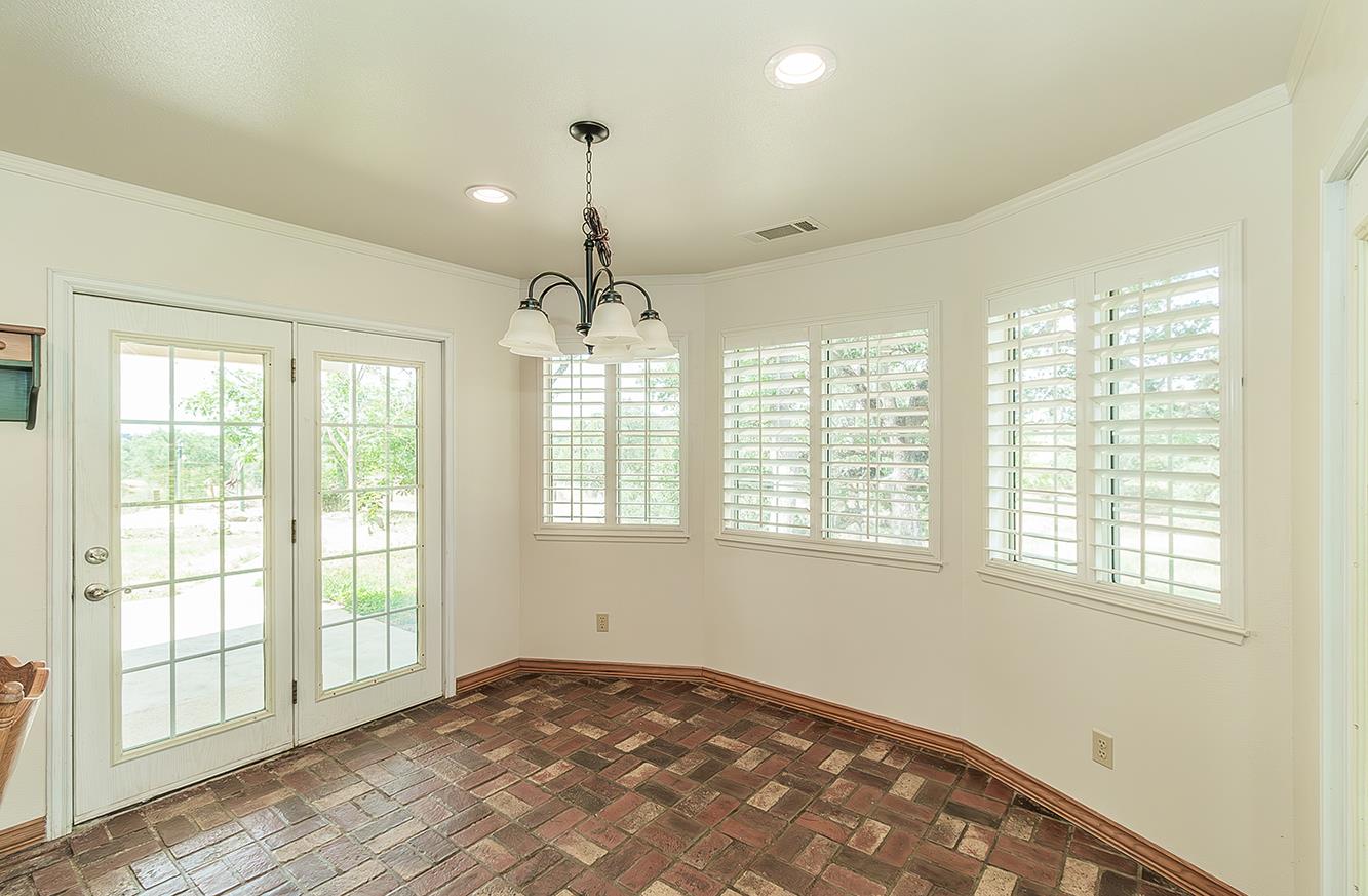 15501 Garlock Lane Prather, CA 93651 - Photo 14 of 47 a view of an empty room with a window