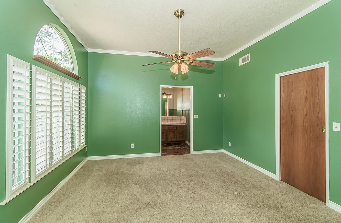 15501 Garlock Lane Prather, CA 93651 - Photo 16 of 47 a view of a room with window ceiling fan and windows
