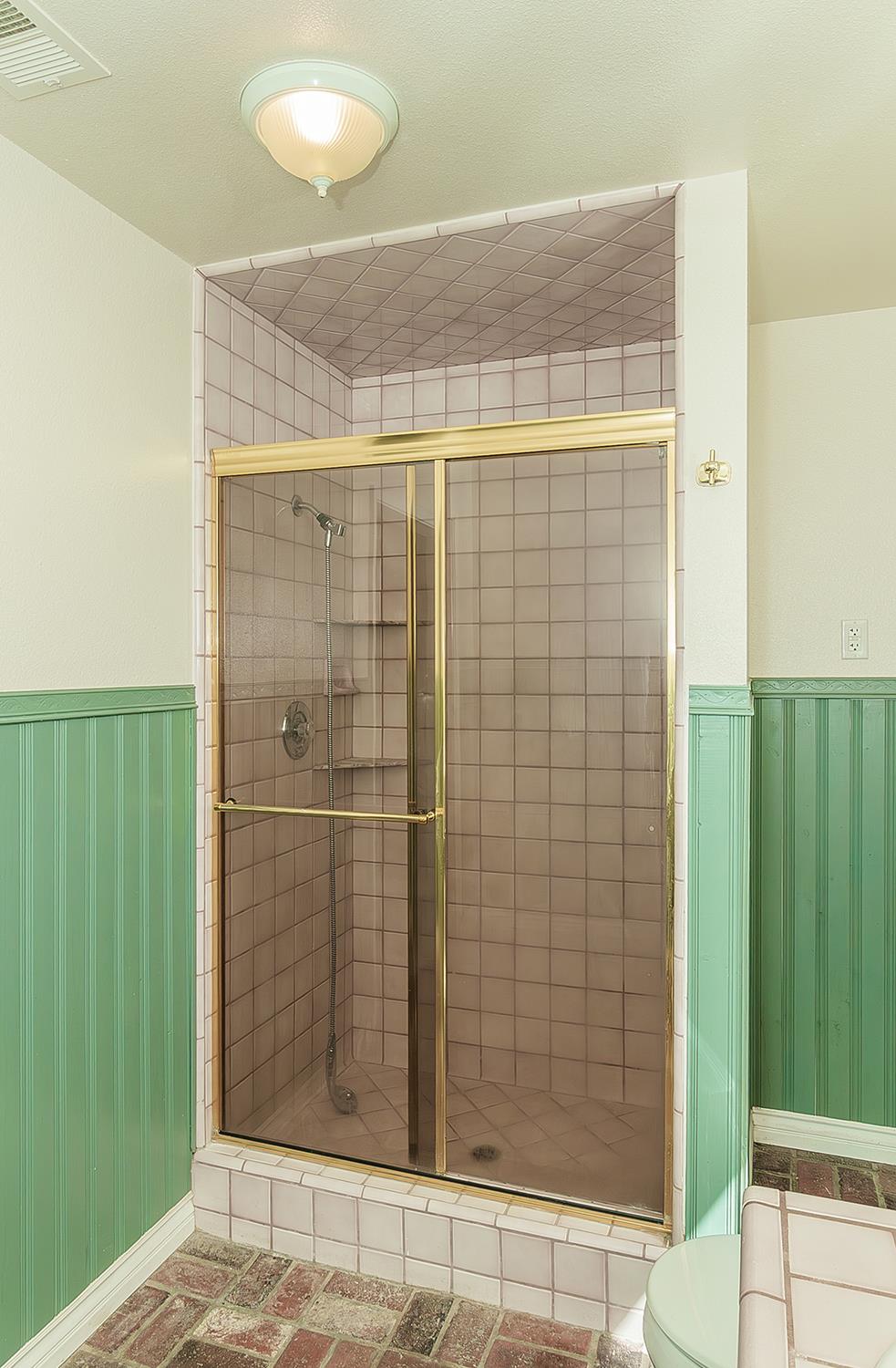 15501 Garlock Lane Prather, CA 93651 - Photo 19 of 47 a bathroom with a shower