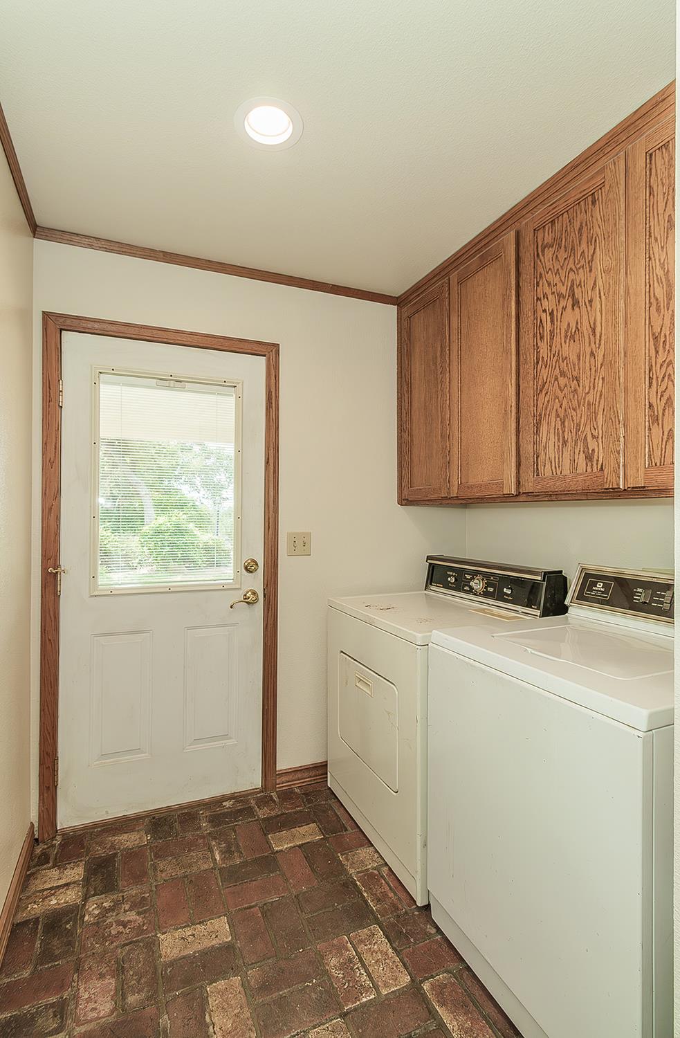 15501 Garlock Lane Prather, CA 93651 - Photo 26 of 47 a room with storage and utility