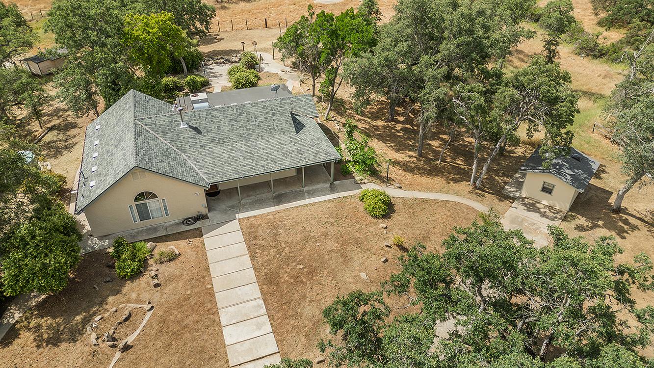 15501 Garlock Lane Prather, CA 93651 - Photo 35 of 47 an aerial view of a house with a yard