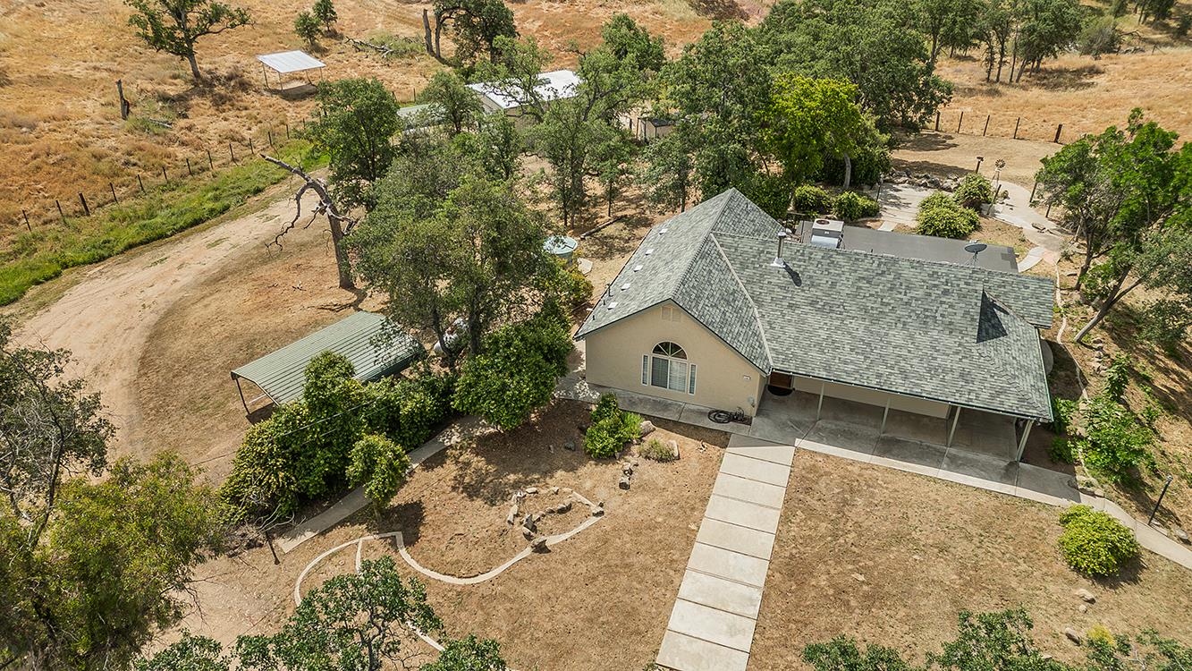 15501 Garlock Lane Prather, CA 93651 - Photo 36 of 47 a view of balcony with wooden floor and outdoor seating