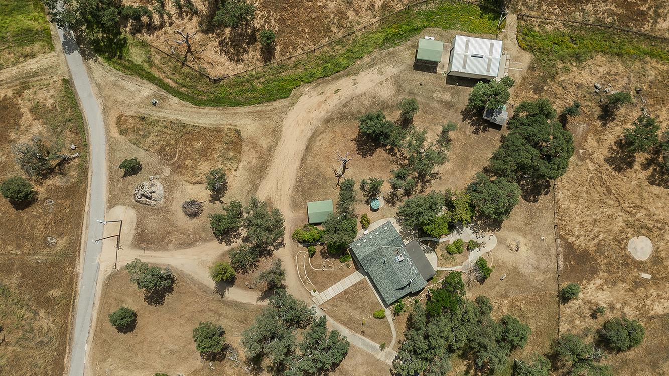 15501 Garlock Lane Prather, CA 93651 - Photo 42 of 47 a aerial view of a house with a yard