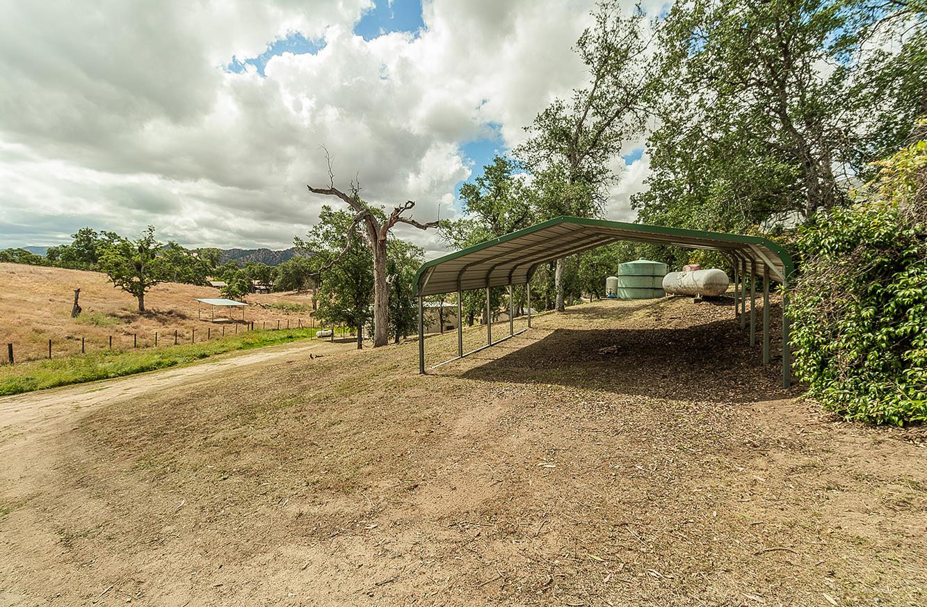 15501 Garlock Lane Prather, CA 93651 - Photo 5 of 47 a view of swimming pool with a yard