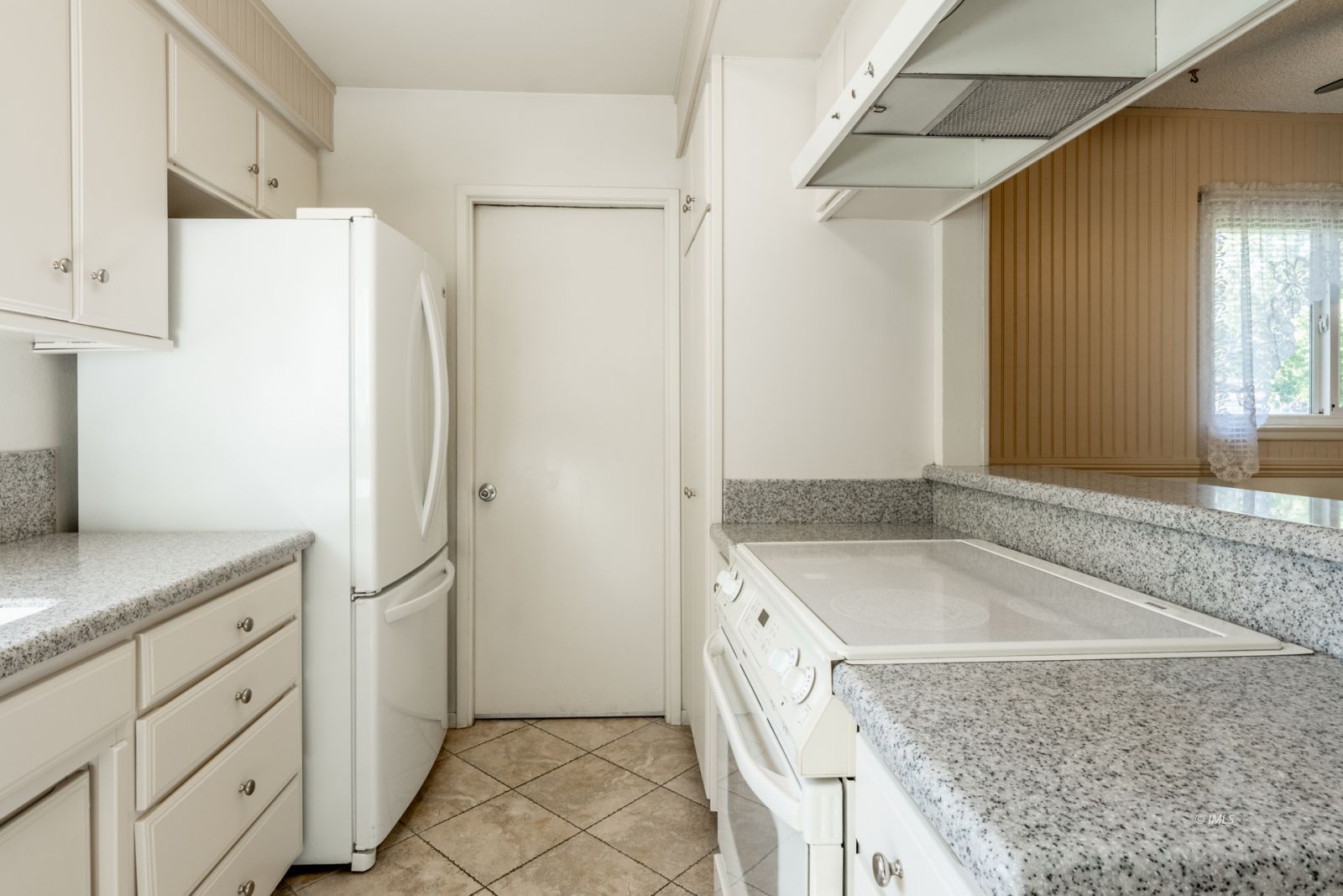 1424 Rocking W Drive Bishop, CA 93514 - Photo 7 of 27 a bathroom with a granite countertop sink and shower