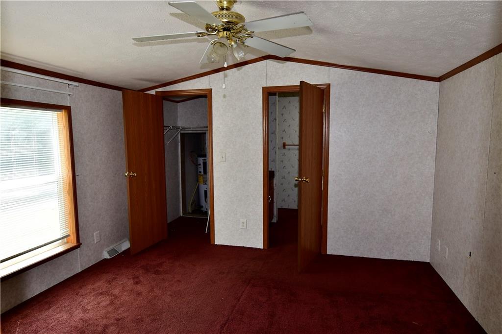 604 Deana Way Rochester, PA 15074 - Photo 16 of 22 a view of hallway with window and wooden floor