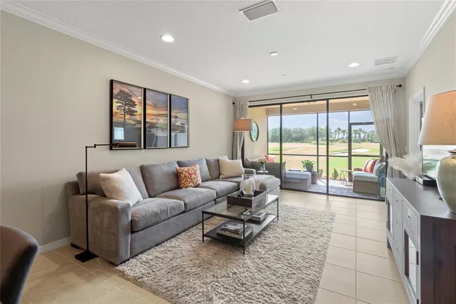 a living room with furniture and a table
