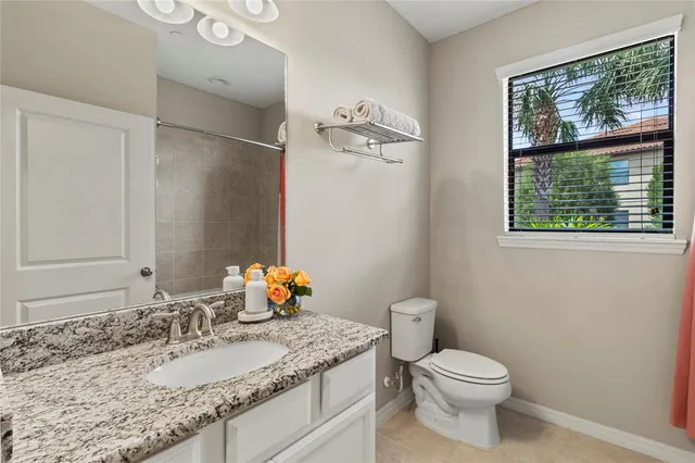 a view of a swimming pool with a yard