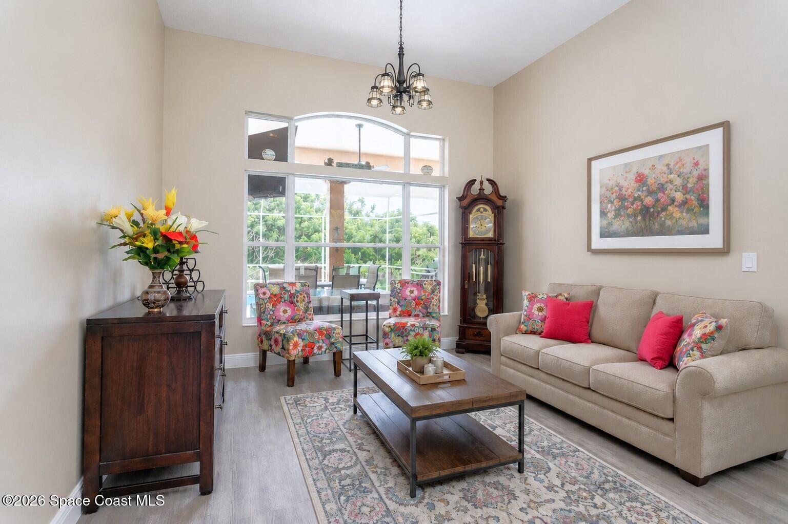 1697 Atrium Drive Melbourne, FL 32935 - Photo 14 of 36 Living room Virtually Staged